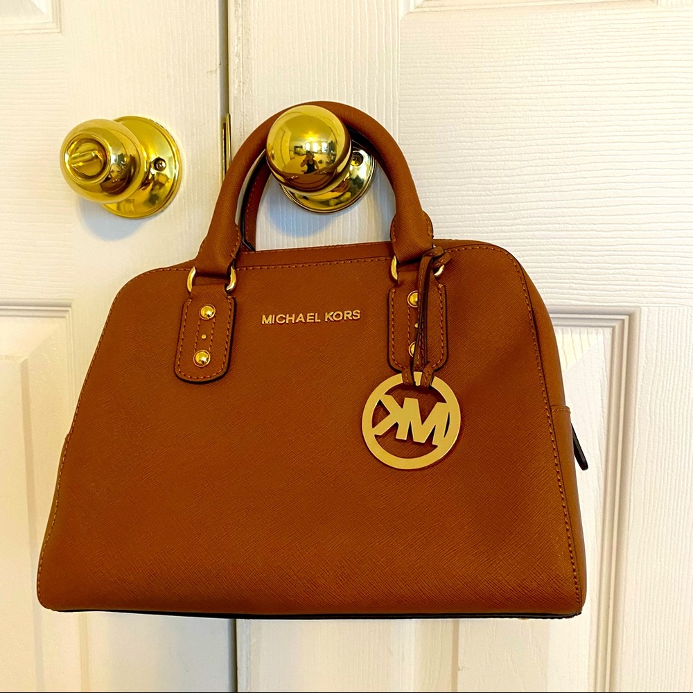 Michael Kors satchel purse with removable shoulder strap.